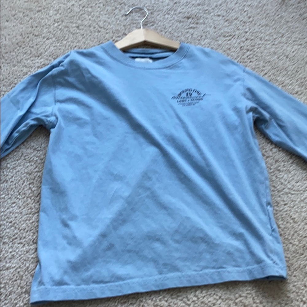 Blue top with tennis club in corner